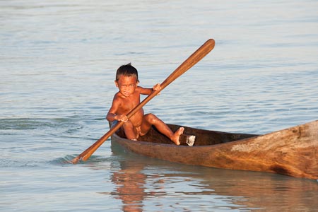 Canoes are like bicycles to every Bajau kid and adult.