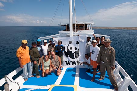 Menami crew, field staff of WWF & TNC, park rangers and the Freund Factory share a moment with the giant panda