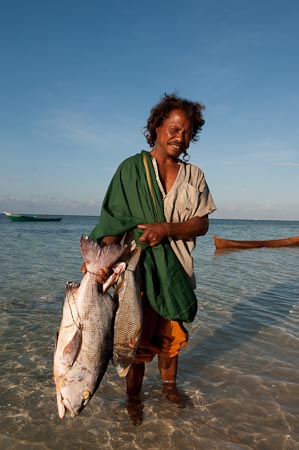 For several days in Anano Island, this man fished, salted and stored his catch before heading back to Runduma where his family lives.
