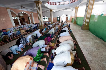 Solemn and together, the men from Danar pray to Allah