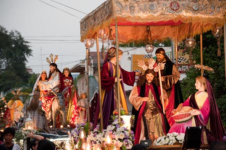 With the procession happening after sunset, carossas are lit with an accompanying generator to light intricate lamps and other light sources to highlight the life size images