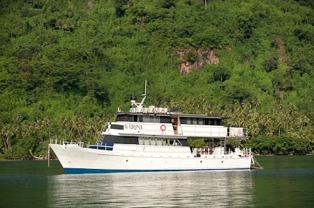 Sporting a new look of all all white, the famous liveaboard FeBrina is moored inside the inactive Witu crater of Garove Island