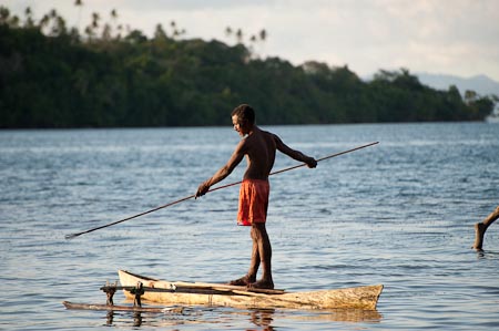 Freedom from hunger. Within a few minutes, this man can catch his family's dinner by simply paddling around the area where they are allowed to fish, outside the marine protected area