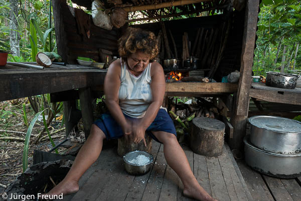 Dee from Ligaulevu Village grates coconut for our special crab meal.