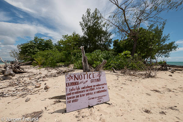 It reads.. "Notice. Katawaqa Turtle Nesting Ground. It is against the law for someone to dig up, use, take or destroy any turtle eggs or in any way molest, take or kill turtles. Monitored by Nadogo Environment Committee. WWF.