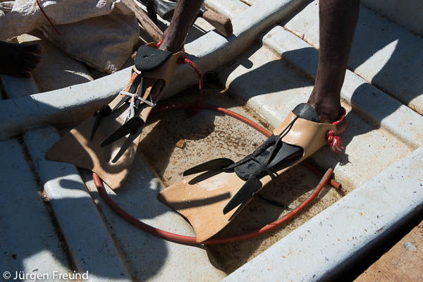 Modified fins using rubber sandals or flipflops for comfort and tightening.