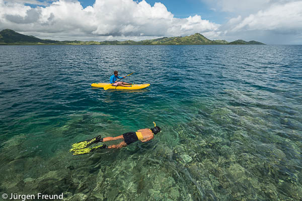 Salote kayaking while I snorkel and finding an abundant number of my favourite blue linckia starfish!