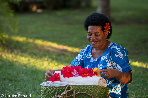 Nukubati Island Resort head of housekeeping Asena Ratabua prepares fresh flowers and towels for the bures or bungalows. 