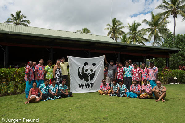 The WWF Flag is unfurled in Nukubati Island Resort with Laitia of WWF SP and the Freunds.
