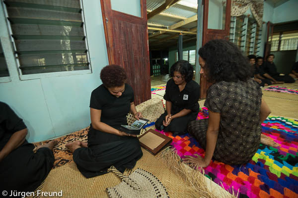 WWF South Pacific Patricia Mallam and Akisi Bolabola  along with other conservation partners from Suva join in for their presentation of mats and masi to honour the late Tui Macuata during his wake in Naduri Village. Other presentation given to the late Tui's family is a photo album made by the Freunds of pictures taken from all over Macuata Province for WWF SP. Receiving the album is the late Tui's daughter Adi Litia Monomono Katonivere.