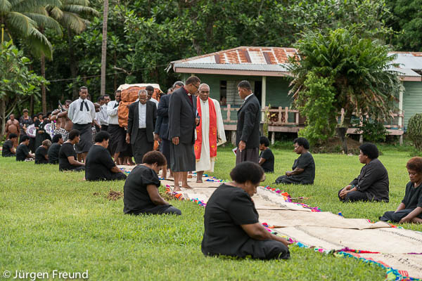 The funeral procession of the late Tui Macuata makes its way to the Church. The white robed man is the retired former head or superintendent of the Methodist Church Reverend Ame Tugauwe.