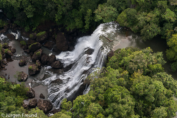 Aerial of a waterfall in the mountains of Vanua Levu, Northern Division.